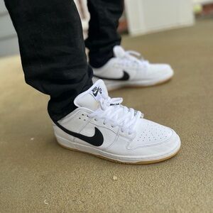 Brand new, never worn. Nike White/Black SB Dunk Low Pro with box